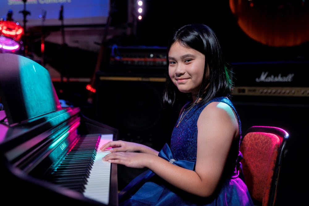 RisingTones_PianoStudent_Performing9.jpg__PID:a2ce1238-bed3-4aa5-8ad0-b8388f1027e0